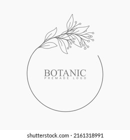 Vector floral hand drawn logo template in elegant and minimal style with black color on grey background illustration. Circle frames logos. For badges, labels, logotypes and branding business identity.