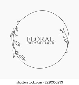 Plantilla de logotipo con dibujo a mano con motivos florales vectoriales en un estilo elegante y mínimo con color negro en la ilustración de fondo gris. Logotipos de marcos de círculo. Para insignias, etiquetas, logotipos e identidad comercial de marca.