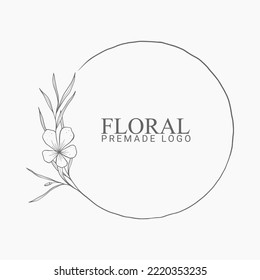 Vector floral hand drawn logo template in elegant and minimal style with black color on grey background illustration. Circle frames logos. For badges, labels, logotypes and branding business identity.