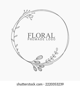 Vector floral hand drawn logo template in elegant and minimal style with black color on grey background illustration. Circle frames logos. For badges, labels, logotypes and branding business identity.