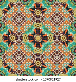 Vector floral medallions seamless pattern in blue, brown and orange colors.