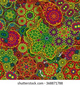 Vector floral paisley seamless pattern. Seamless pattern with mehendi elements. Colorful green orange red wallpaper background.
