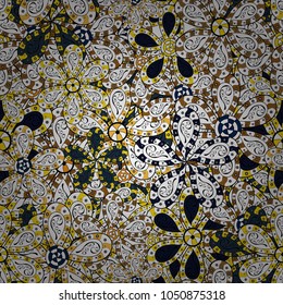 Vector floral pattern in doodle style with flowers. Gentle, spring floral on white, black and yellow colors. Vector illustration.