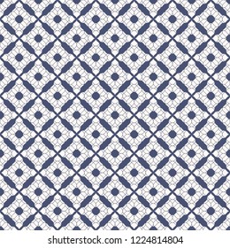 Vector floral seamless pattern. Abstract decorative texture with small flower silhouettes, curved shapes, lace, tissue. Deep blue and white background. Elegant geometric ornament. Repeatable design