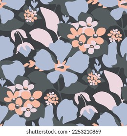 Vector floral seamless pattern. Blue, pink and beige flowers, blue leaves on a dark background.