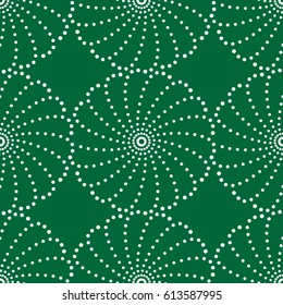 Vector floral seamless pattern of dots on green background.