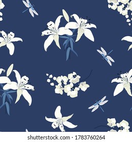 Vector floral seamless pattern with lilies, orchid and dragonflies on a blue background. For decoration textile, packaging.