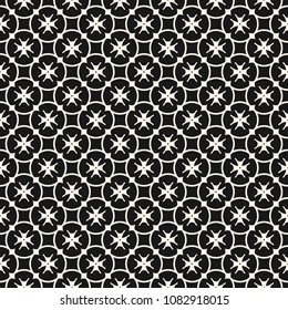 Vector floral seamless pattern. Luxury geometric background with small flower shapes, rounded grid, lattice, crosses, stars, repeat tiles. Dark abstract ornamental texture. Black and white design