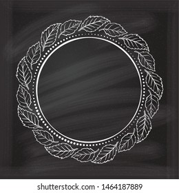 Vector floral vintage frame on a chalkboard background.