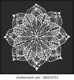 Vector flower mandala on black charcoal background