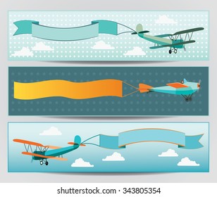 Vector flying airplanes with empty banners
