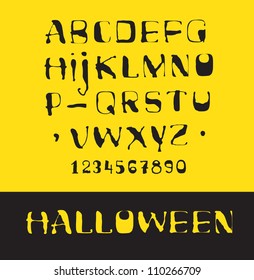 Vector fonts. Black letters on a yellow background / Halloween
