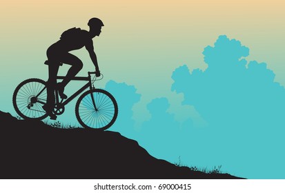 Silueta vectorial de un hombre en una bicicleta de montaña
