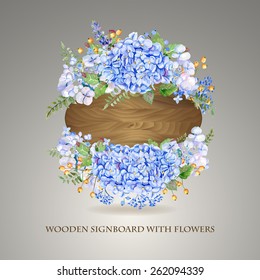 Vector frame of blue watercolor hydrangea and berries on wooden background. Illustration wreath of flowers. Can be used as a greeting card for Valentine's day, birthday, mother's day and so on.