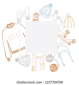 Vector frame with hand drawn winter knitted clothes