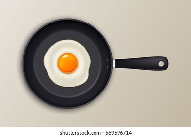 Vector fried egg on a black pan. Realistic icon.
