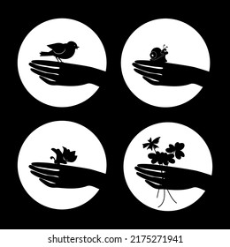 Vector friendly nature emblems for logo design . A human's hands are holding   bird, butterfly, flowers,  snail.  Line style,  Print, graphic style. Black silhouettes on the white.