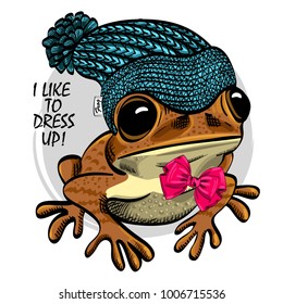 Vector frog with blue knitted hat and red bow. Hand drawn illustration of dressed frog. 