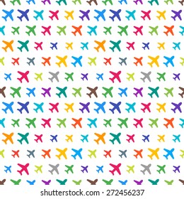 Vector funky colorful seamless pattern with random material design colors. Festive tiled airplane icon pattern.