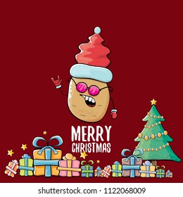 vector funky comic cartoon cute brown smiling santa claus potato with red santa hat, gifts, tree and calligraphic merry christmas text isolated on red background. vegetable funky christmas character