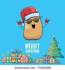vector funky comic cartoon cute brown smiling santa claus potato with red santa hat, gifts, tree and calligraphic merry christmas text isolated on blue background. vegetable funky christmas character