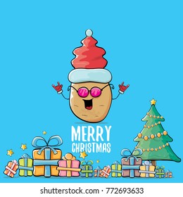 vector funky comic cartoon cute brown smiling santa claus potato with red santa hat, gifts, tree and calligraphic merry christmas text isolated on blue background. vegetable funky christmas character