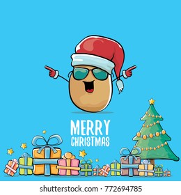 vector funky comic cartoon cute brown smiling santa claus potato with red santa hat, gifts, tree and calligraphic merry christmas text isolated on blue background. vegetable funky christmas character