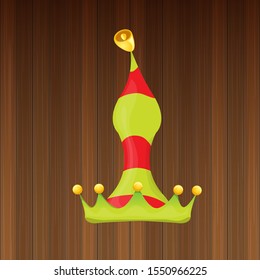 vector funky red and green stripped cartoon christmas elf hat isolated on wooden background. vector kids colorful elf hat icon or label. Christmas decorative design element for banner, flyer or poster