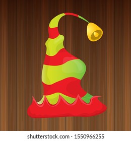 vector funky red and green stripped cartoon christmas elf hat isolated on wooden background. vector kids colorful elf hat icon or label. Christmas decorative design element for banner, flyer or poster