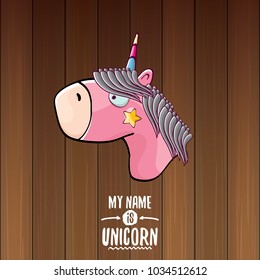 vector funny cartoon cute pink fairy unicorn head with horn isolated on wooden background. My name is unicorn vector concept illustration. funky hand drawn kids animal character