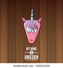vector funny cartoon cute pink fairy unicorn head with horn isolated on wooden background. My name is unicorn vector concept illustration. funky hand drawn kids animal character