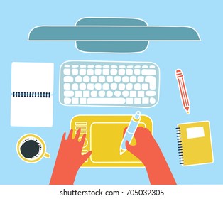 Vector funny colorful cartoon illustration of top view mock-up of graphic designer workplace. Computer monitor, keyboard, headphones, pencil, cup of coffie, notebook and tablet