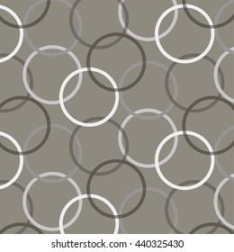Vector geometric background of gray rings on dark - gray background.
