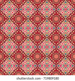 Vector geometric beige, red and pink seamless background.