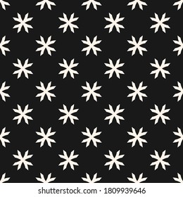 Vector geometric floral pattern. Ornamental seamless texture in ethnic style. Abstract monochrome ornament with flower shapes, crosses. Elegant black and white background. Dark repeatable design