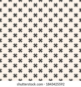 Patrón floral geométrico vectorial. Textura sin foco de estilo étnico. Resumen adorno monocromo con pequeñas formas florales, pequeñas cruces, estrellas. Fondo blanco y negro. Diseño repetible simple