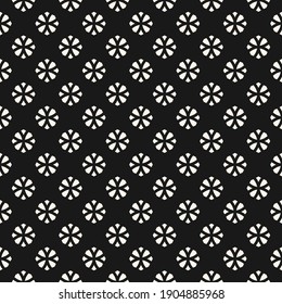 Vector geometric floral seamless pattern. Simple monochrome ornament with small flower silhouettes, diamonds. Abstract ornamental black and white background. Dark repeat design for decor, print, cover