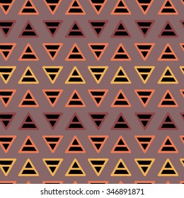 Vector geometric pattern with brown, yellow, orange and black triads on light brown background. Seamless pattern can be used for wallpaper, pattern fills, web page background, surface textures.