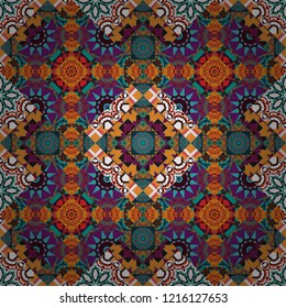 Vector geometric purple, orange and blue seamless background.