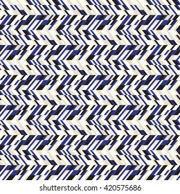 Vector geometric seamless chevron pattern with zigzag line and crossing stripes in vintage blue color. Striped bold print in hipster style for winter fall fashion. Abstract monochrome tech background