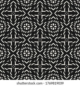 Vector geometric seamless pattern. Abstract ethnic texture with ornamental grid, mesh, lattice, flower silhouettes, crosses. Oriental motif. Black and white ornament background. Dark repeat design