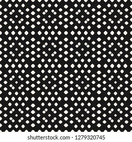 Vector geometric seamless pattern with dots, spots, petals, leaves. Simple abstract monochrome texture. Black and white dotted perforated background. Repeat design for decor, print, wrapping, textile