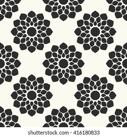 Vector geometric seamless pattern. Ethnic seamless background. Abstract flowers textile print. Round shapes fabric swatch. Monochrome wallpaper.
