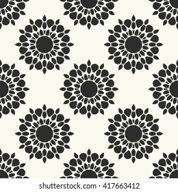 Vector geometric seamless pattern. Ethnic seamless background. Abstract flowers textile print. Round shapes fabric swatch. Monochrome wallpaper.