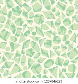 Vector geometric seamless pattern of hexagons, triangles, rhombuses, circles, rectangles in green and yellow colors. Textured abstract background of scattered and overlapped geometrical shapes.