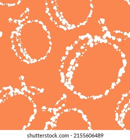 Vector. Geometric seamless pattern. Juicy apricot, peach, consisting of dots of different sizes, dotted line. Spotted abstract fruity summer background. Design for paper, cover, fabric, interior decor
