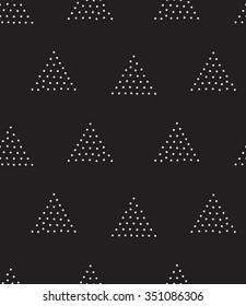 Vector geometric seamless pattern. Repeating abstract triangle gradation in black and white dots. Modern pointillism design