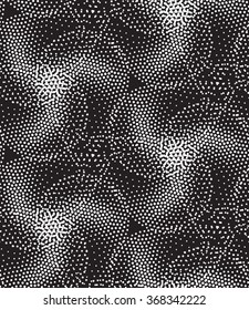 Vector geometric seamless pattern. Repeating abstract triangles gradation in black and white. Modern halftone circle design, pointillism