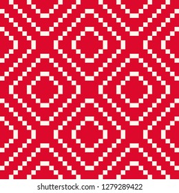 Vector geometric traditional Scandinavian ornament. Fair isle seamless pattern. Folk ethnic motif. Simple texture design with squares, crosses, rhombuses. Red and white repeat embroidery background