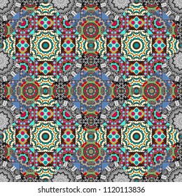 Vector geometrical seamless ornament. Seamless pattern in brown, blue and gray colors. Vector background with tiles and rhombus.